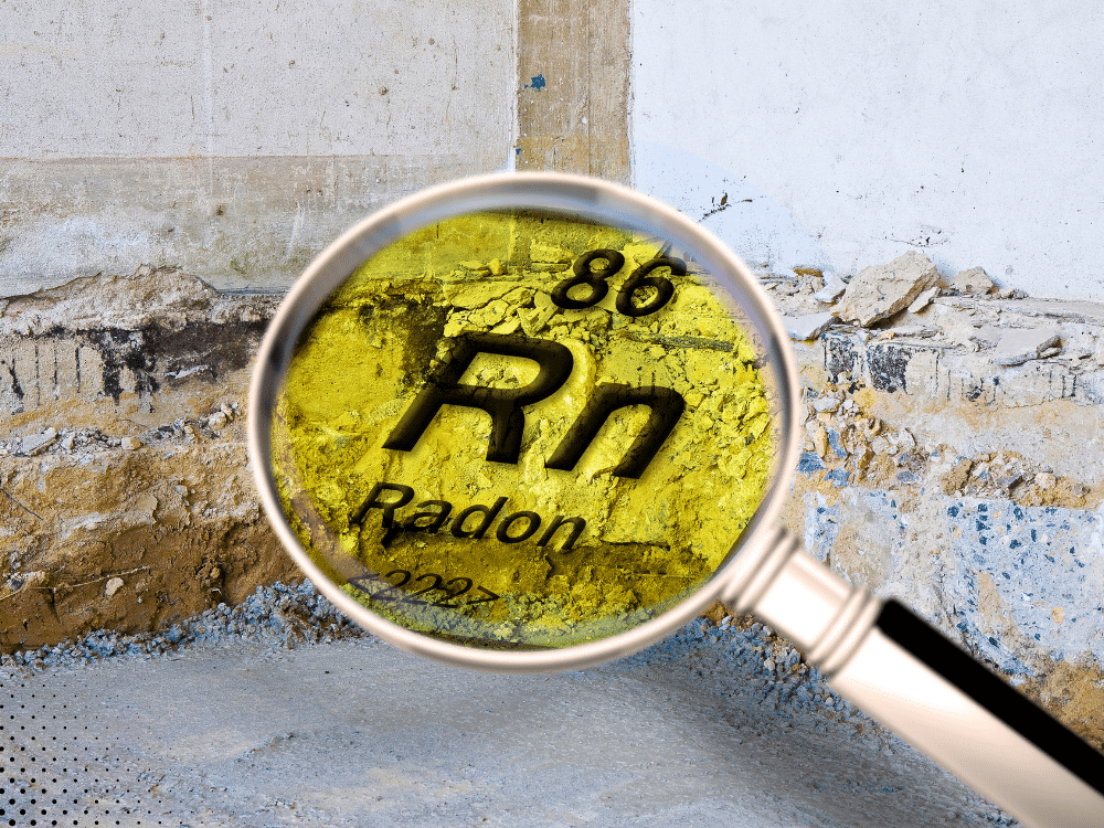 Magnified radon element illustration over cracked foundation surface.